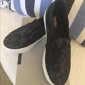 Black lace slip on sneaker